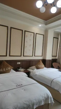 Zhenxiong Shunyi Hotel (Wude Town Branch) Отели рядом с достопримечательностью «Tiankeng Group»