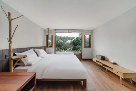 Xianqingshan Homestay (Xihu Qingzhiwu) Отели рядом с достопримечательностью «Wanxiang Polytechnic»