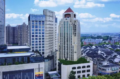 Jinglai Hotel·Selection (Shanghai Songjiang Shopping Mall) Отели рядом с достопримечательностью «Автобусная станция Cheng Long Road»
