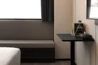 Meihao R Royalss Hotel （Qingdao Zhanqiao Railway Station Branch） - 비치 리조트