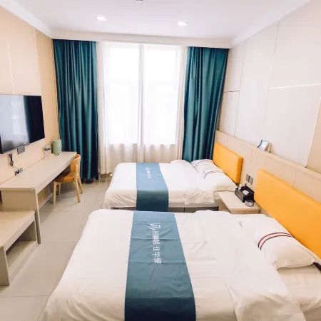 UP Huayi Hotel (Jixi Shi Railway Station Wanda Plaza)