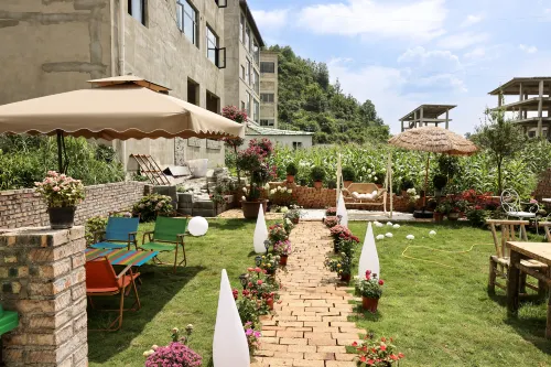Fengji Xiaozhu · Villa Designer Smart Resort Garden B&B (Huangguoshu Waterfall) - balcony