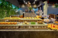 Qingmu Platinum Hotel (Guanghan Bailun Square Tianjie Branch)