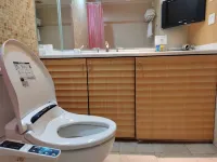 Aihe Jinlun Apartment Hotel