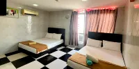 Bukit Beruntung Business Hotel - Habitación Cuádruple