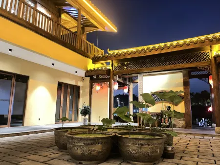 Hexuan Yashe  Chongqing Отели рядом с достопримечательностью «Dazu Stone Carving Baoding Mountain Scenic Area - Guiding Service Hall»