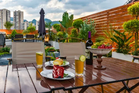 Wuyue Inn Residence Отели рядом с достопримечательностью «Libo Shuichun River Rafting»