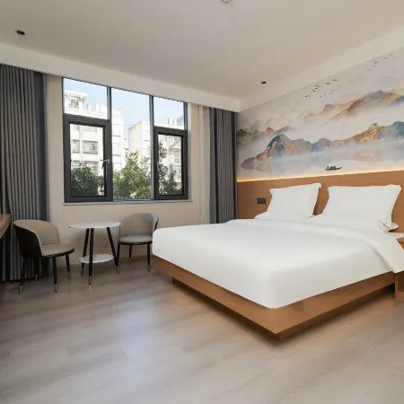 Wenshan Boting Hotel (Sanqi International Trade Market South City Bus Station)