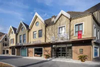 Mujiangnan Hotel (Taizhou Medical City Oriental Town Branch) Hotels near Kouan Ornamental Building Scenic Area (Chaixu Ancient Town)
