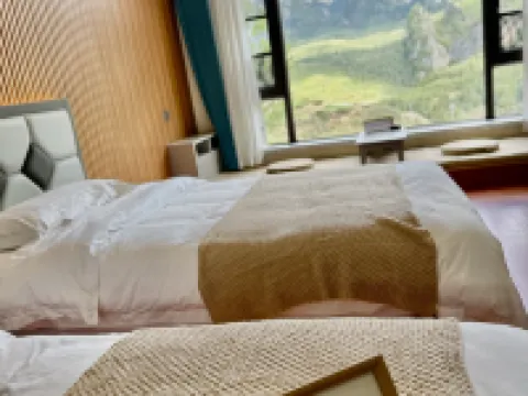 Lotus Forget-Worry Lodge · Facing Main Peak with Sunrise View (Zagana Scenic Area Branch) Hoteles en Têwo