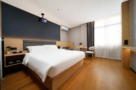 Yunduo Bao Hotel (Yugan Desheng Street Store) Отели рядом с достопримечательностью «Lake Biwa Scenic Area»