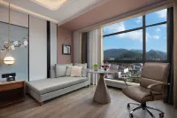 Meihao Hotel (Liuyang River Scenery Bridge Store) Hotels near Xihu Mountain