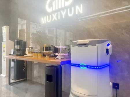 Muxi Hotel (Lanxi Baolong Plaza Store)