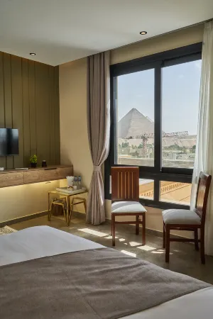 Pyramids Secret Hotel Отели в г. Kafr Nassar