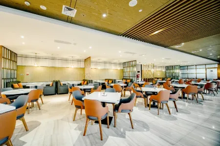 Meihao Lizhi Hotel (Haikou West Coast International Convention & Exhibition Center Branch) Отели рядом с достопримечательностью «Jinshawan Coastal Park»