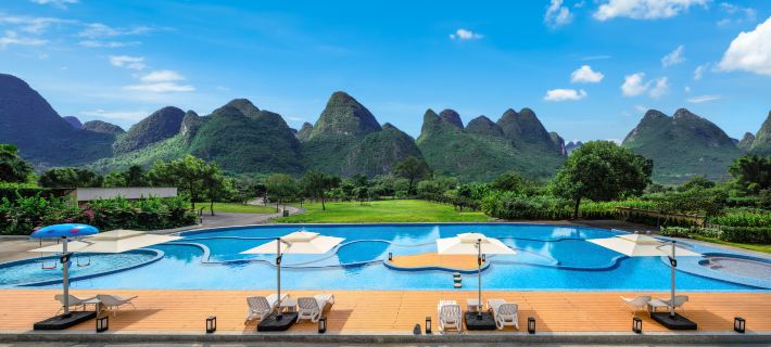 Xishi Manor Resort Hotel(Yangshuo Ten-MileGallery Yulong River Branch) Отели в г. Яншуо