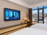 Yili  Xinyuan Renjoy Hotel（Newly Opened Food Plaza Shop）