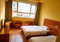 Zhenxi Express Hotel (Xinyang Railway Station Tianrun Plaza)
