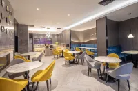 Huaju Hotel (Wenfeng World Store, Middle Jianghai Road, Qidong) - Desayuno