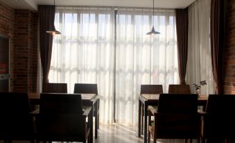 Pai Hotel (Xinchang Qixing Residential District Branch)