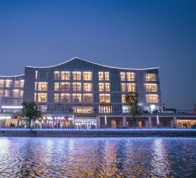 Liaocheng Log House Homestay (Dongchang Lake Branch) โรงแรมใน