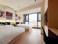 Qiuguo Business Hotel (Zunyi High-speed Railway Station) Hotels in Zunyi Railway Station Area