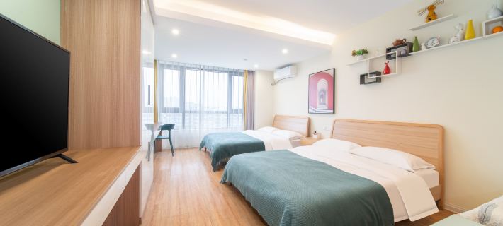 Justin Boutique Hotel Apartment (YangZhou Shouxihu Scenic Area Dongguan Street Branch) Hotele w: Yangzhou