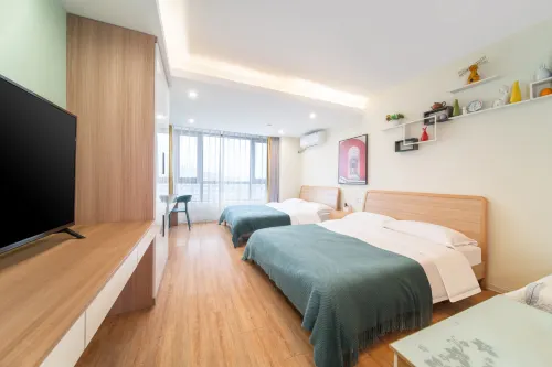 Justin Boutique Hotel Apartment (YangZhou Shouxihu Scenic Area Dongguan Street Branch) - Condos