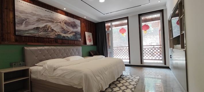 Zoupingxingquan Farm House Отели в г. Луаньпин