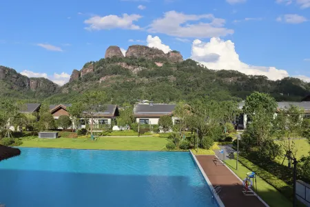 Longyan Guan Zhai Jun Lan Resort Hotel Отели рядом с достопримечательностью «Jiulong Lake (Jiulong Cave Cluster)»