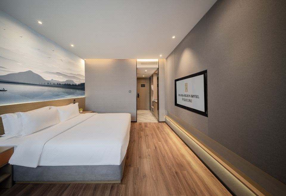 화하 호텔 샤먼의 편안한 침실