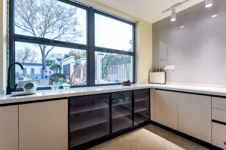 Sister Zhou's Guest House Отели рядом с достопримечательностью «Ботанический сад Цзяньнан»