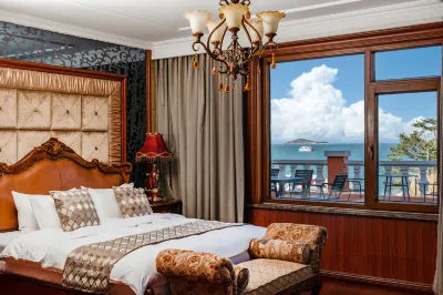 European sea view homestay in the ancient castle (Yaokou beach shop in Laoshan scenic area) Отели рядом с достопримечательностью «Лумофонная дыра»