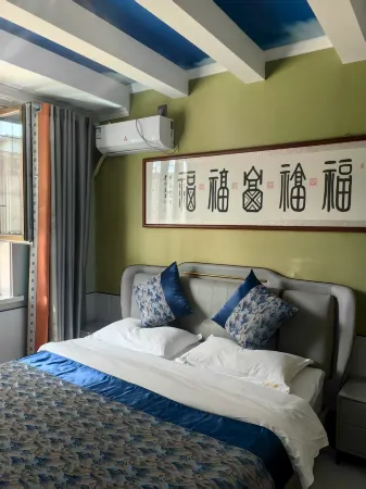 Jinta Jinwu Homestay Отели в г. Цзиньта