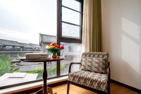 Leju Hotel (Kaifeng Qingming Shanghe Garden Wansui Mountain Martial Arts City Branch) Отели рядом с достопримечательностью «Longting Scenic Area»