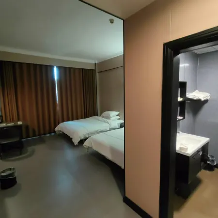 Jinyu Business Hotel (Yuekelong Department Store)