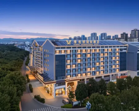 Vienna Hotel(Maitre Lake spring Township hot spring shop) Hoteles en Ciudad de Mile