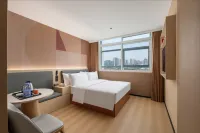 橘子酒店（孝感東站湖北工程學院店）