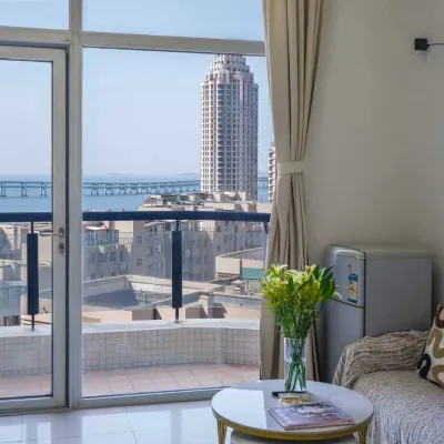 Sunset Xinghai Scenic Apartment (Dalian Stasia Ocean World) Отели рядом с достопримечательностью «Парк Синхай»