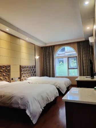 First Forest Hot Spring Hotel FLOWER BAY Отели рядом с достопримечательностью «Xiling Snow Mountain»