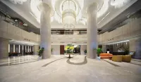 Li Cai Tian Qi Hotel