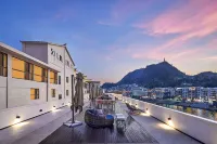 Jiulong Yipin Hotel (Zhenyuan Ancient City New Bridge)