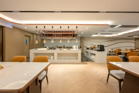 Madison Hotel Binzhou Bincheng Wanda Plaza Отели рядом с достопримечательностью «Binzhou Polytechnic»