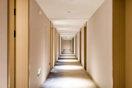 Happiness Gate Business Hotel Отели рядом с достопримечательностью «Weihai Happiness Gate»