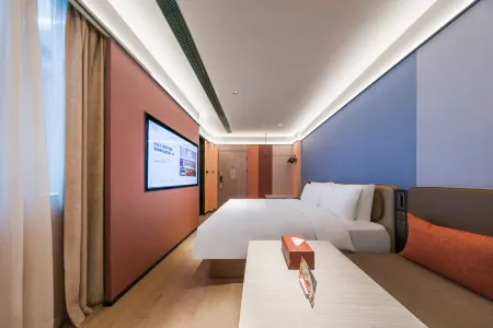 Orange Hotel (Hangzhou Fuyang Guihua West Road Metro Station Branch) Отели рядом с достопримечательностью «Hangzhou Polytechnic (Gaoke Road)»