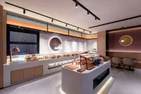 Ni Hao Hotel (Shucheng Meihe Road Kelaguangchang Plaza)