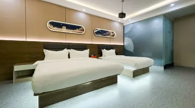 Yuanqi Jinxuan Business Hotel (Daqing Ophthalmology Hospital) Hotéis em Xincun University Town