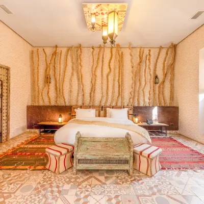 The Source Hotel Music & Spa Hotels near La Plage Rouge