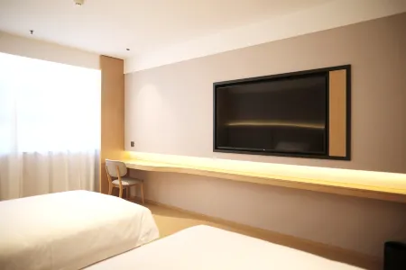 Elong Anyun Hotel (Tangshan Qian'an Fengle Da Road) Отели в г. Цянань