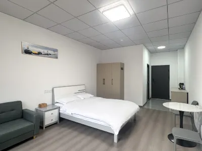 Taizhou Junyi Apartment Отели рядом с достопримечательностью «Чжэньская Коммерческая улица»